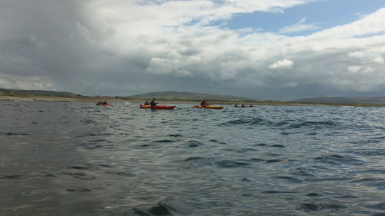 Kayakers learning to sea kayak with Paddle and Pedal